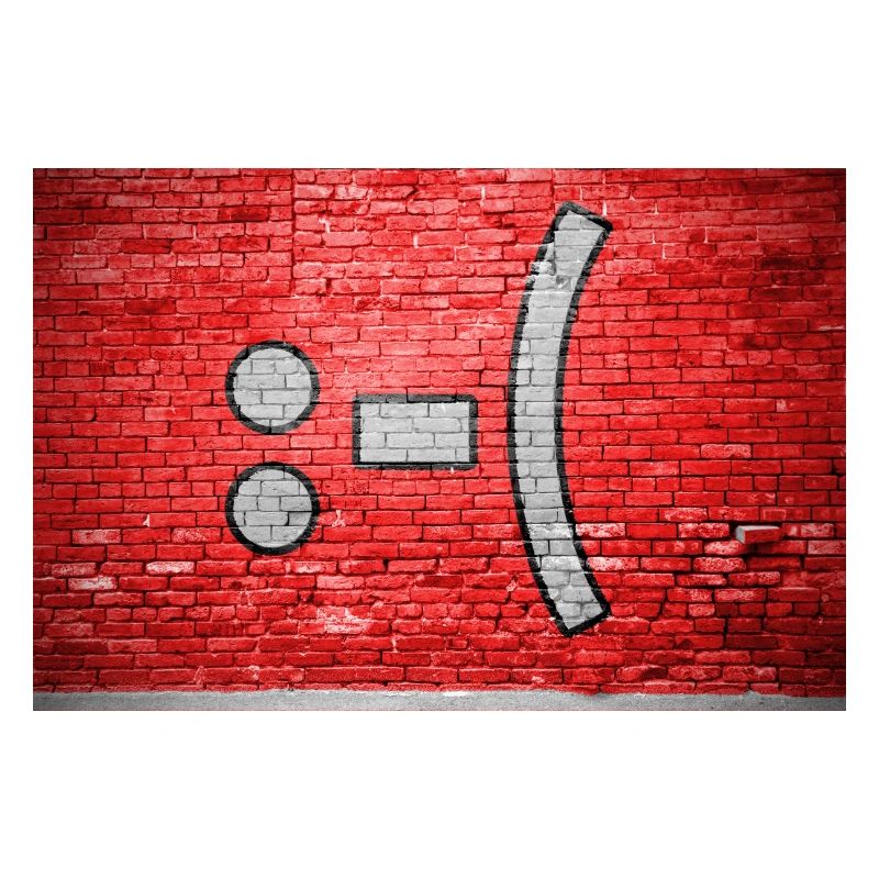 negative Smiley lettering saying Graffiti :-(