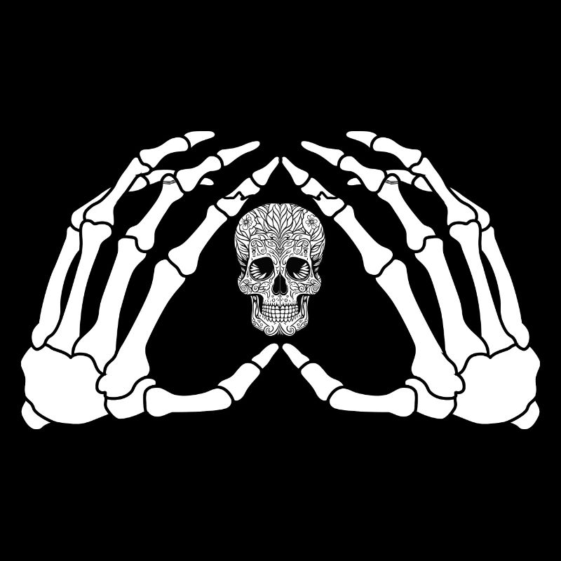 Les mains d’un squelette avec le crâne