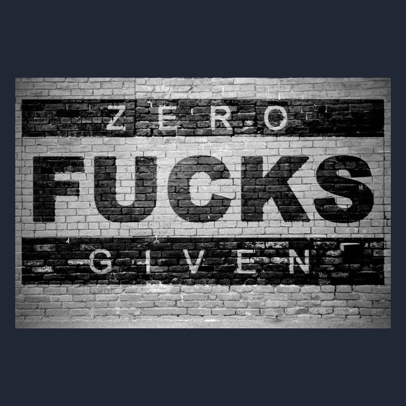 Zero Fucks Given Graffiti sur le mur de briques