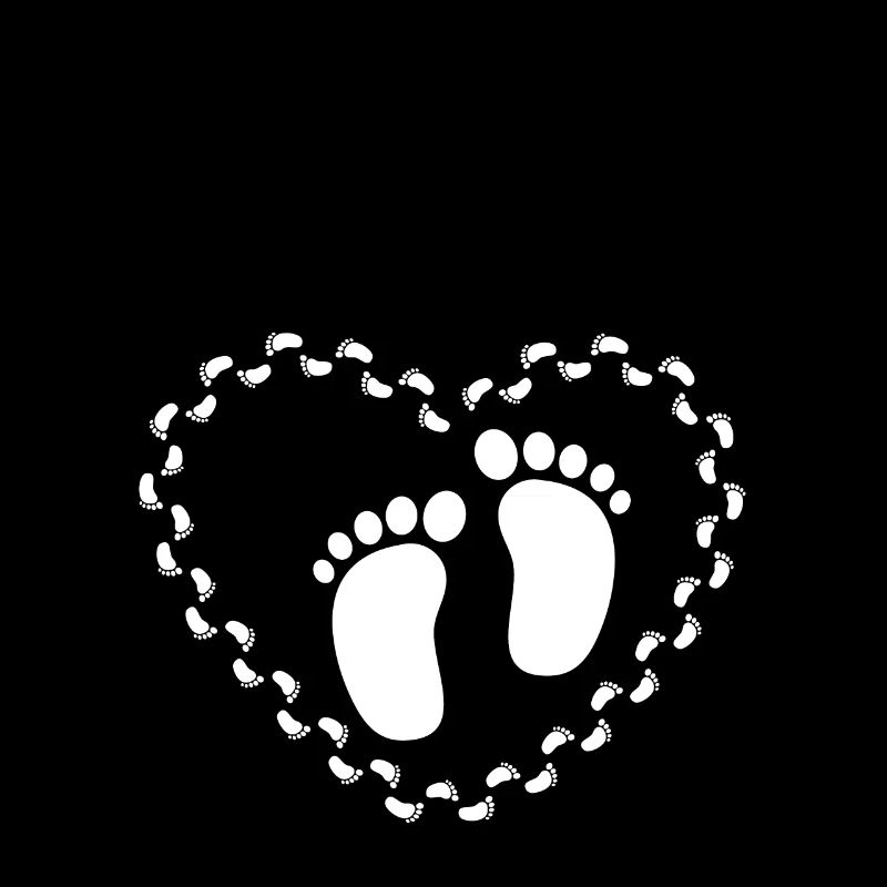 Bébé pieds coeur empreinte grossesse ventre