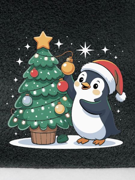 Pinguin schmückt Weihnachtsbaum