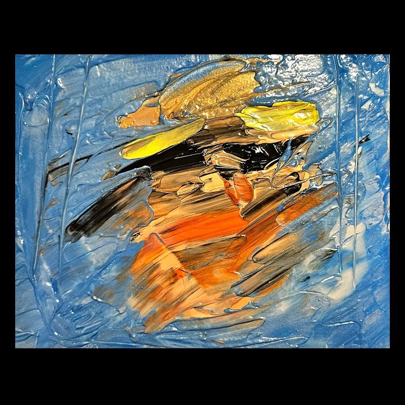 Blauer Farbwirbel im Orange