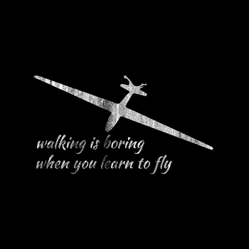 Glider pilot running plane