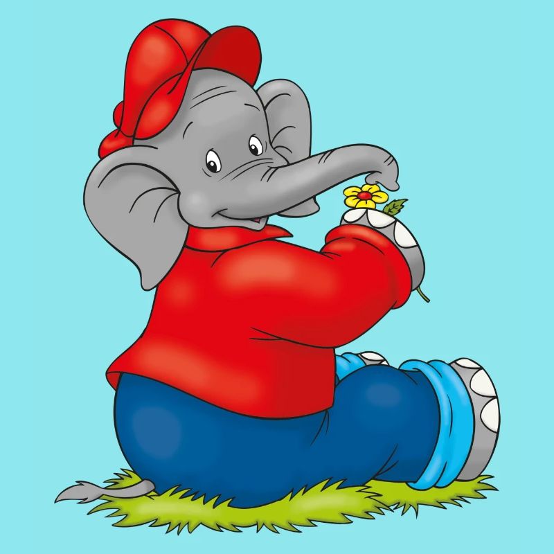 Benjamin Blümchen sitzt auf der Wiese