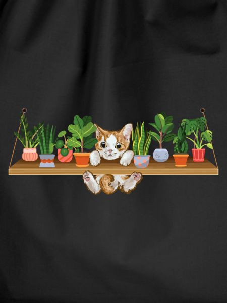 Playful kitten plant owner