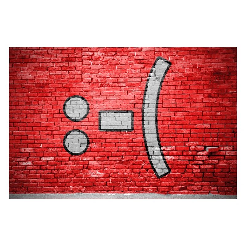 negative Smiley lettering saying Graffiti :-(