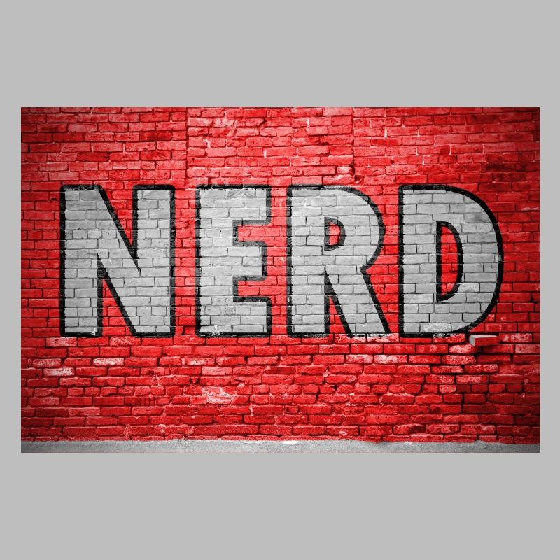 Graffiti de nerd sur un mur de briques