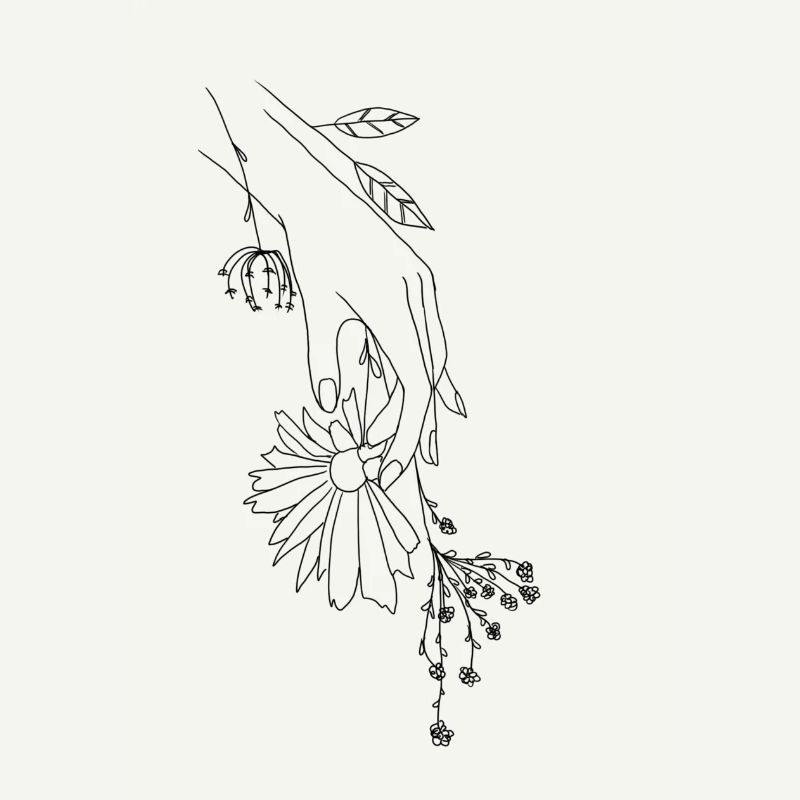 Main avec des fleurs.