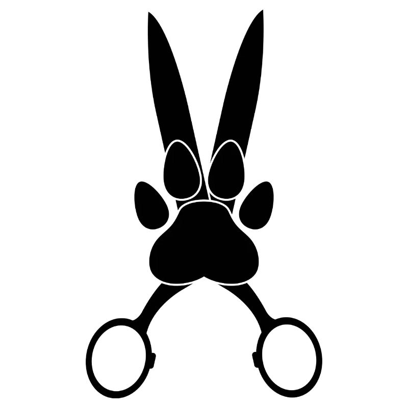 Patte de chien sur ciseaux