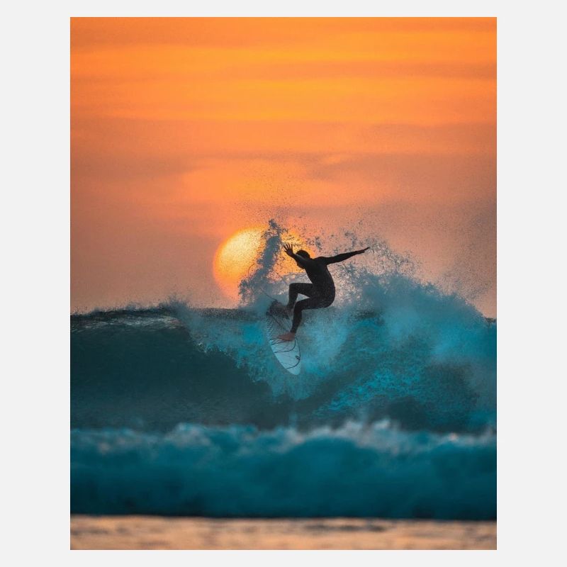 surfer riding on waves
