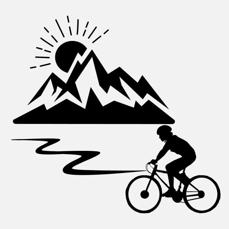 Radfahrer mit Bergen im Hintergrund und Sonne verschwindet