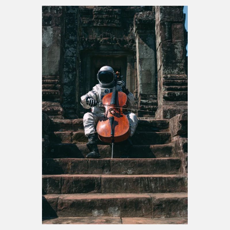 Astronaut Playing Cello at Ancient Temple