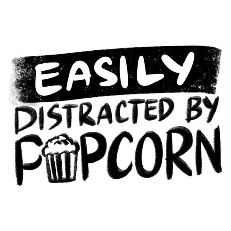 Distrait par le pop-corn mangeant du maïs