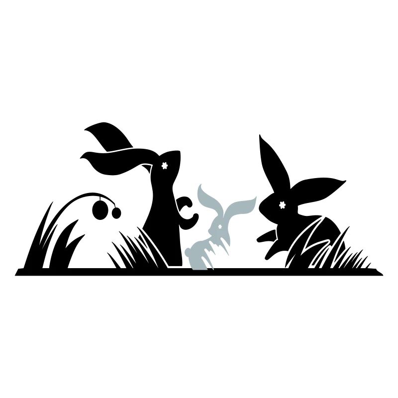 drei Hasen auf einer Wiese