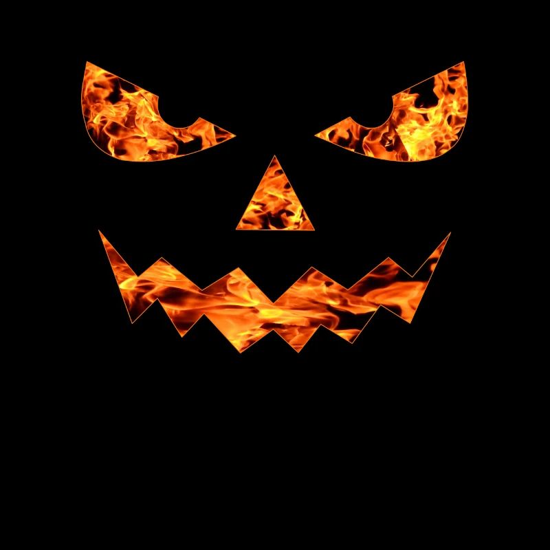 GRIMACE DE VISAGE DE FEU D’HALLOWEEN DE CITROUILLE