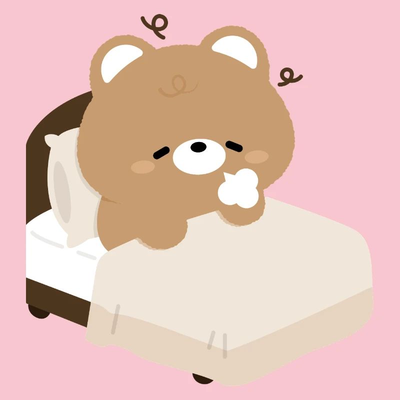 Ours endormi sur le lit