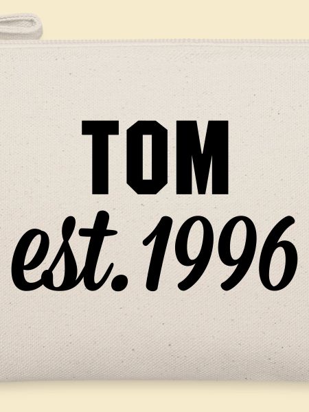 Tom est 1996