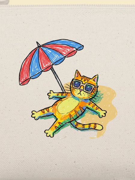 Bunte Strandkatze mit Sonnenschirm