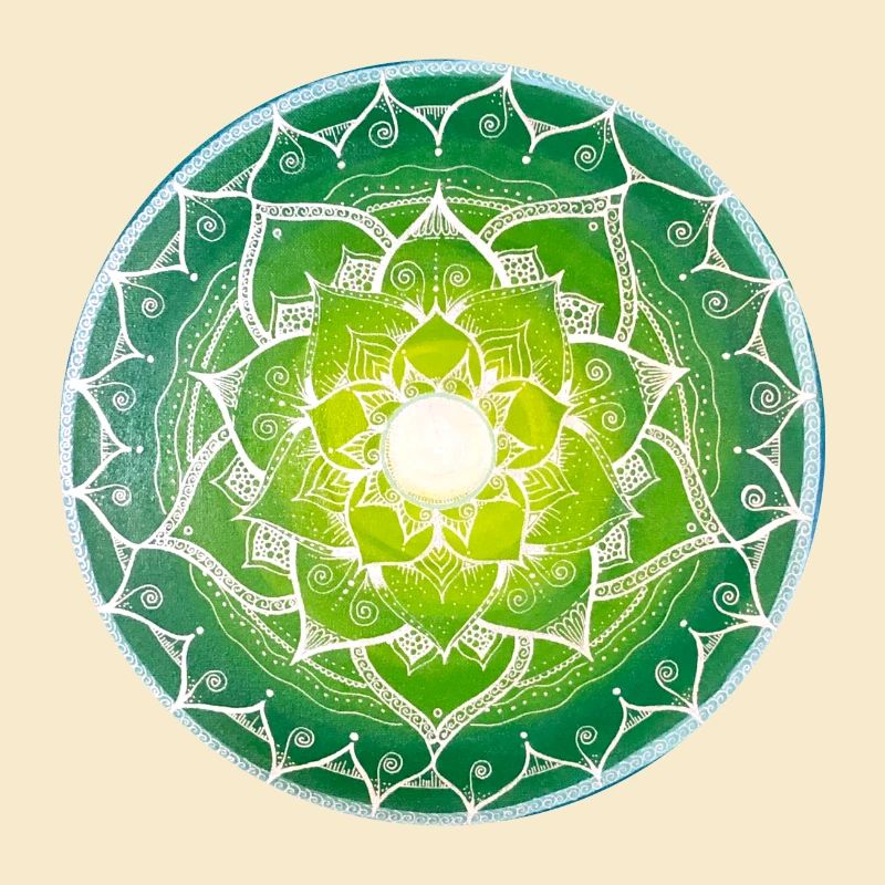 Green mandala with spiritual pattern