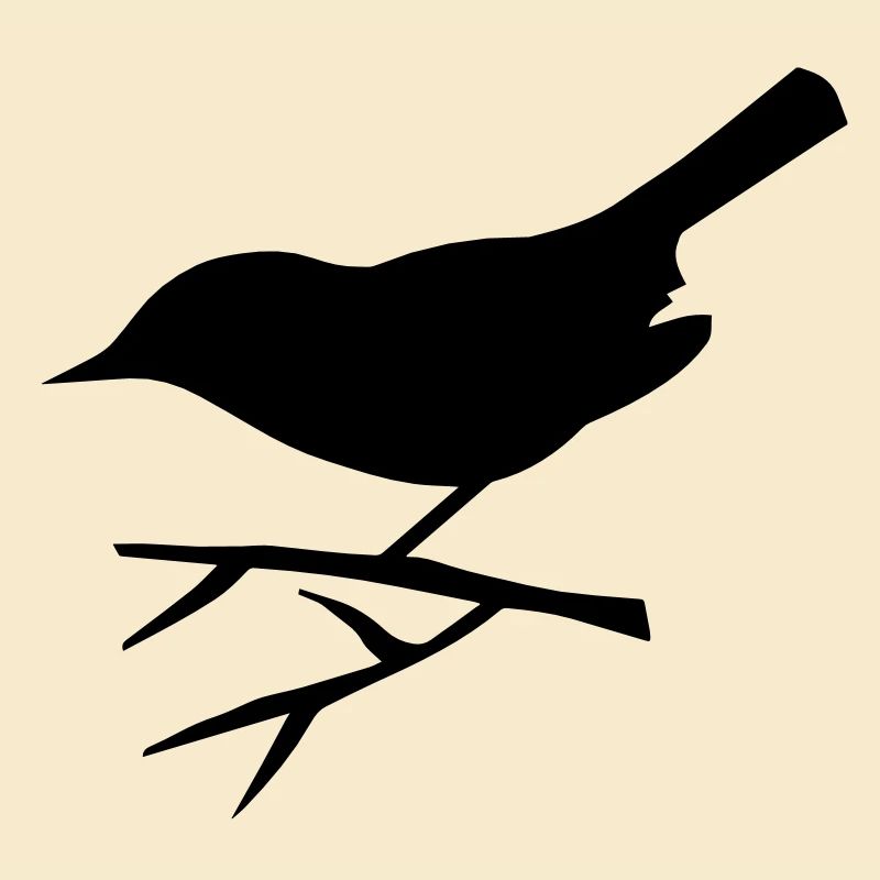Un petit oiseau assis sur la branche