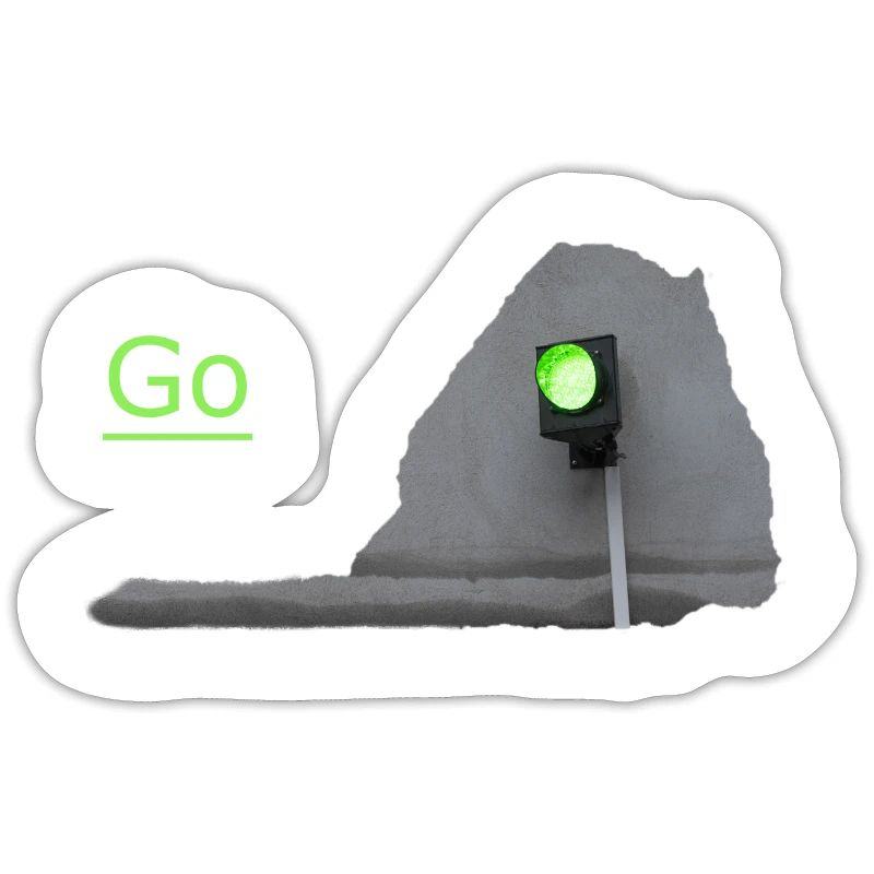 Le feu de circulation brille en vert devant le gris