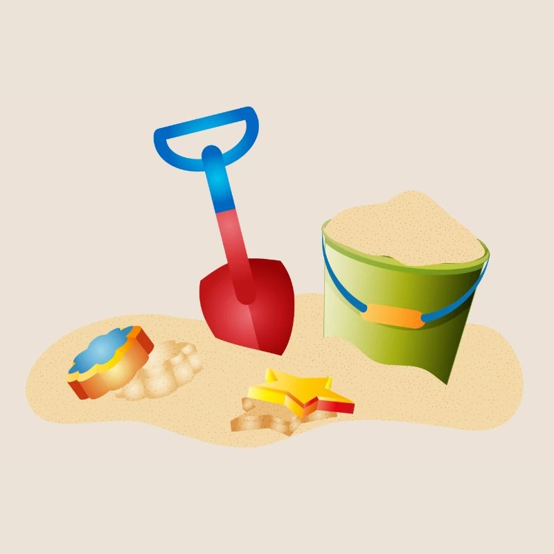 Jouets de sable sur la plage ou dans le bac à sable