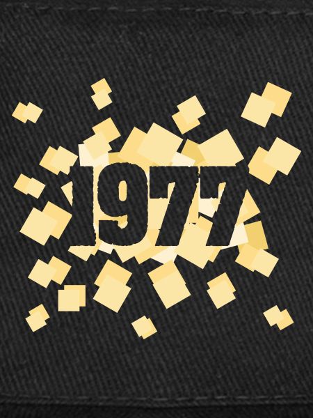 Né en 1977