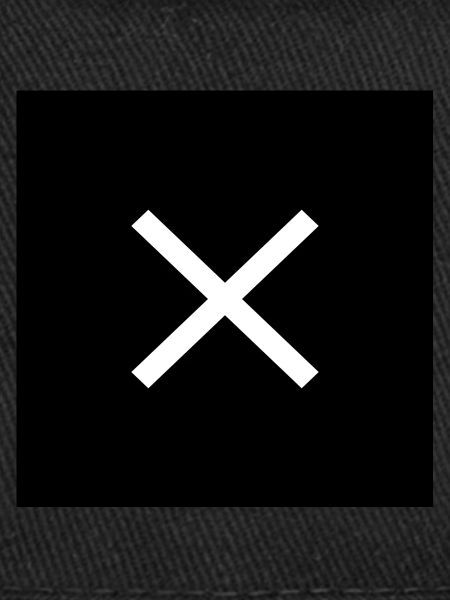 Cross white on black