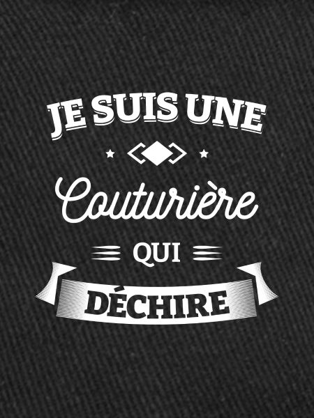COUTURIÈRE QUI DÉCHIRE