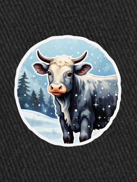 Rind auf winterlicher Alm