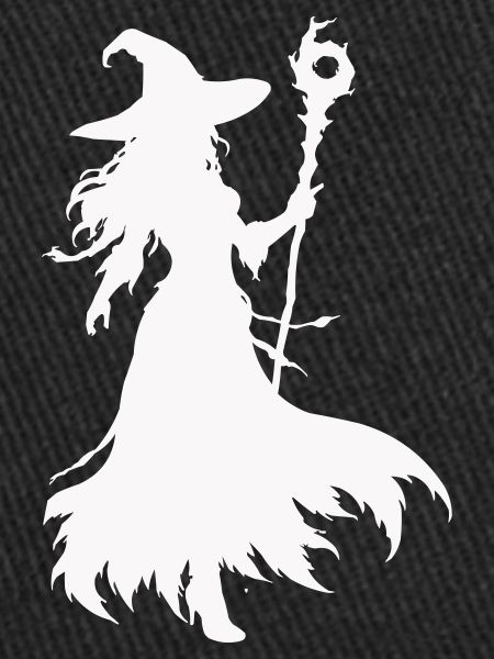 Silhouette de sorcière avec bâton