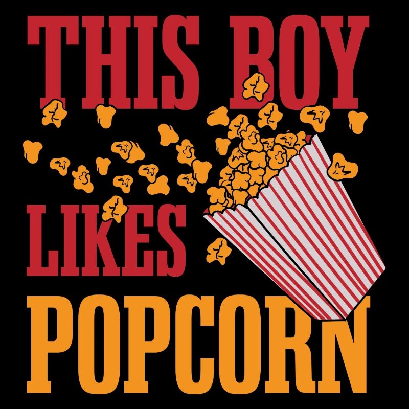 Un garçon aime le pop-corn et les films mangeant