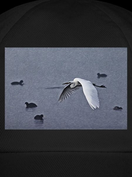 Great egrets in flight
