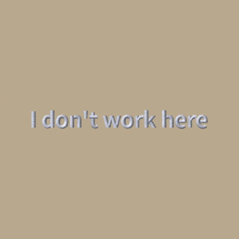 Statement "I don't work here" embroidered