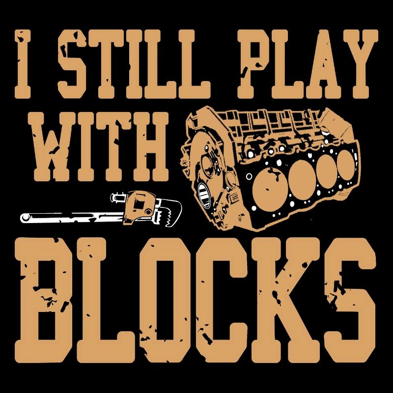 Funny Auto Mechanic Still Plays With Engine Blocks