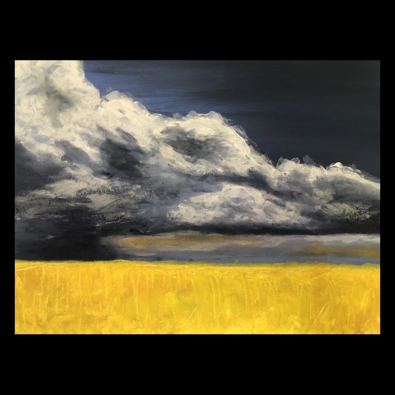 Rabsfeld vor Gewitterwolken