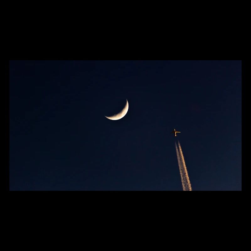 Der Mond und das Flugzeug