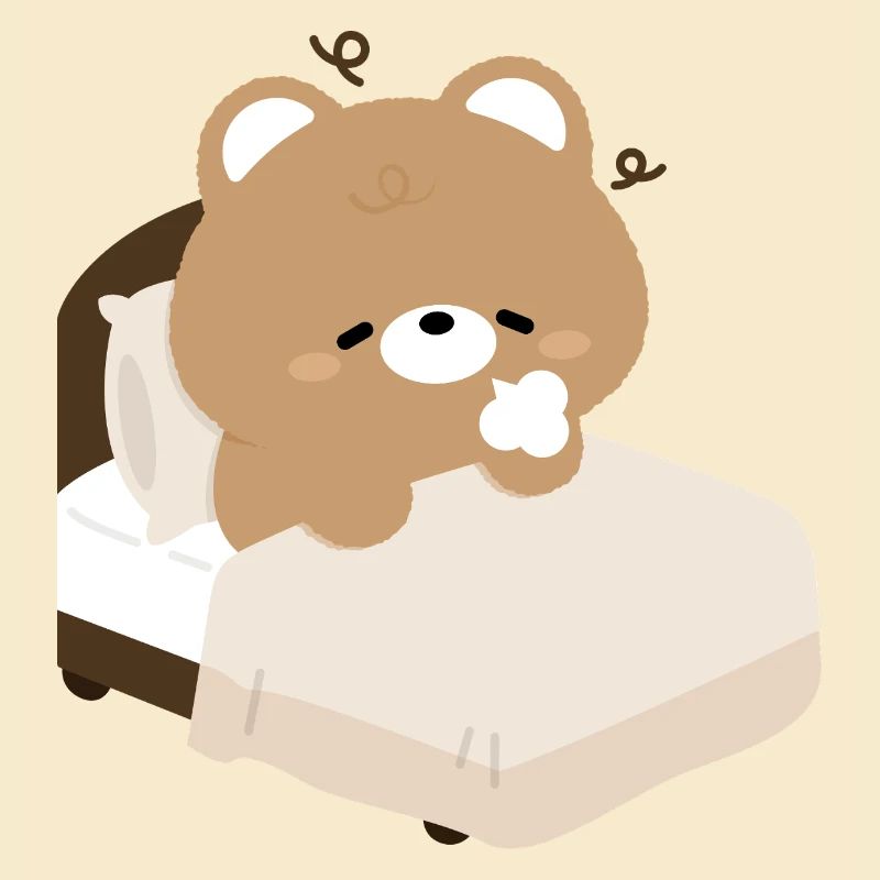 Ours endormi sur le lit