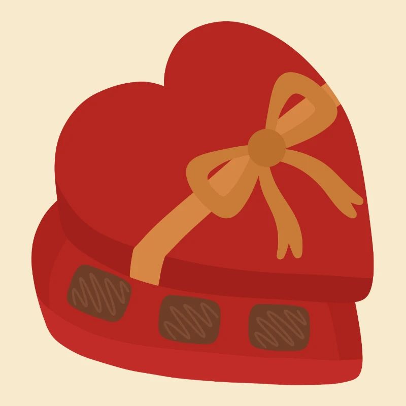 Boîte de chocolats en forme de cœur avec ruban doré