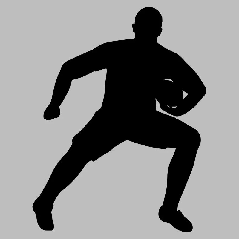 Rugby player defending ball