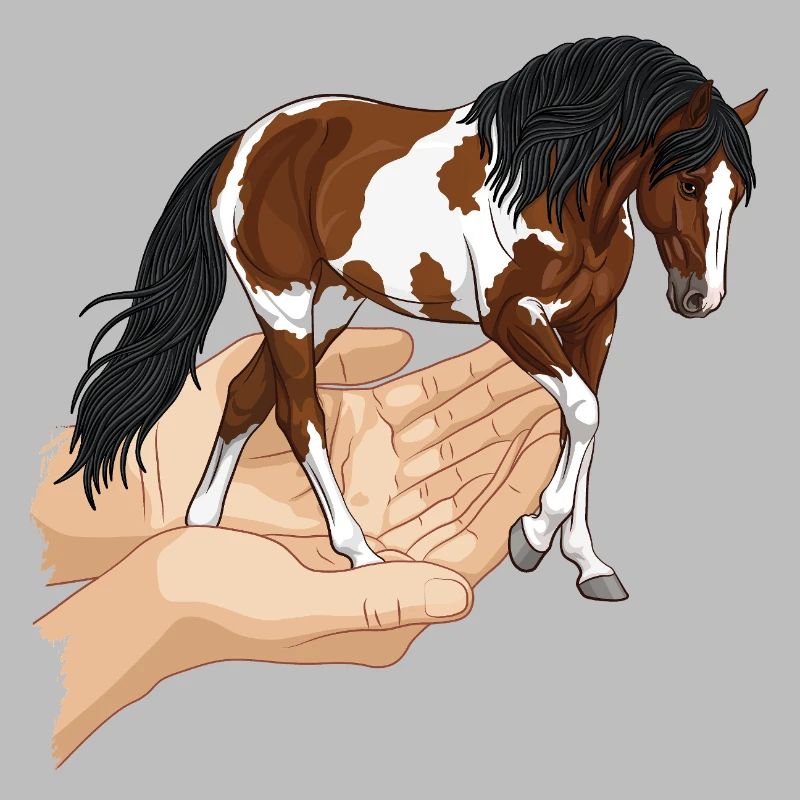 Un cheval pie qui sort de deux mains jointes