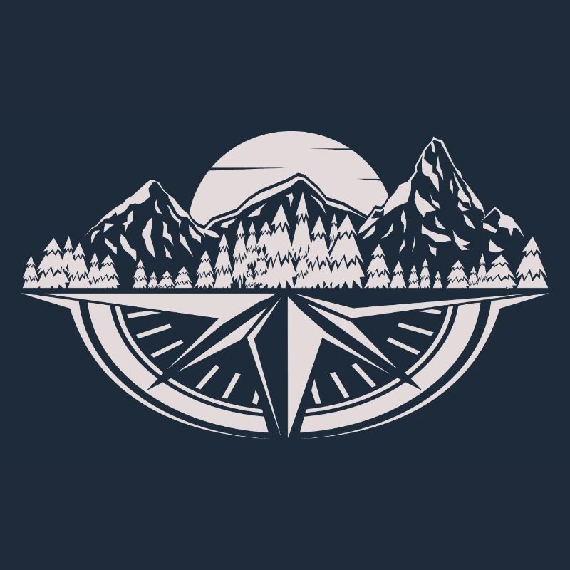 Mountains, forest & compass at sunset