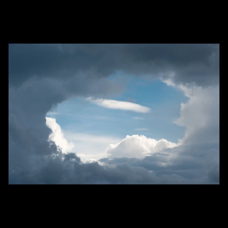 A light hole in the overcast sky