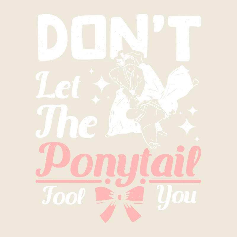 Fille d’aïkido ne vous laissez pas tromper par la queue de cheval