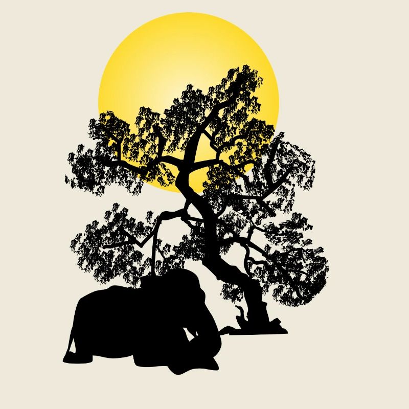 Yellow moon over tree silhouette