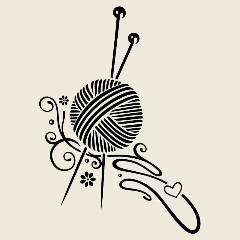 Knitting needles with wool and flowers.