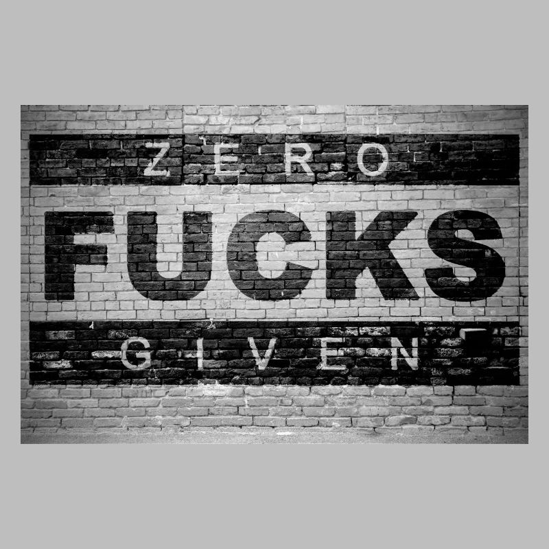 Zero Fucks Given Graffiti sur le mur de briques