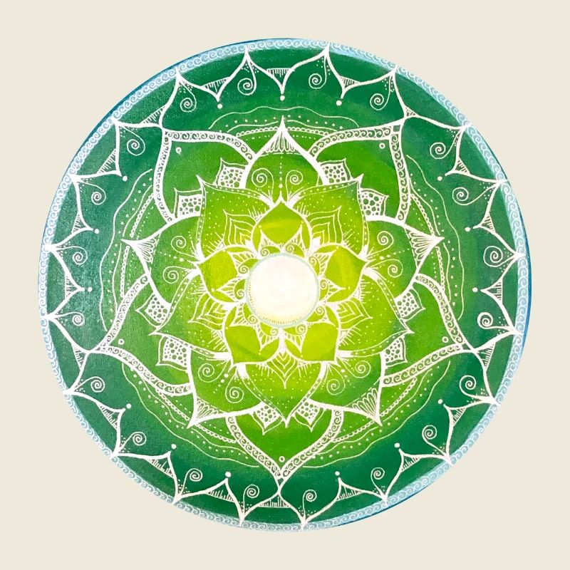 Green mandala with spiritual pattern