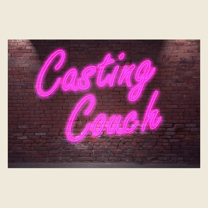 Néon lettrage Casting Couch sur le mur de briques