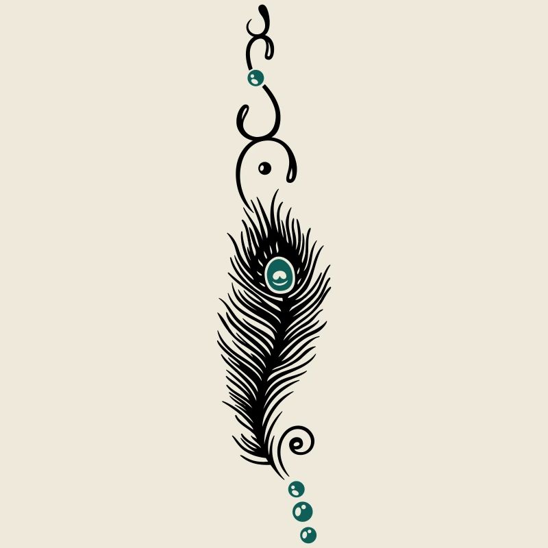 Plume de paon sur un ruban et perles.